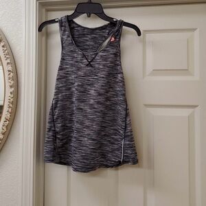 Athleta Running Run Singlet Tank Top size Is a size small.